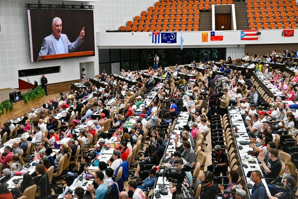 Cuba’s President Miguel Díaz-Canel gives a welcome speech to participants of the Nuestra América Convoy at the Convention Palace in Havana on March 20, 2026.
