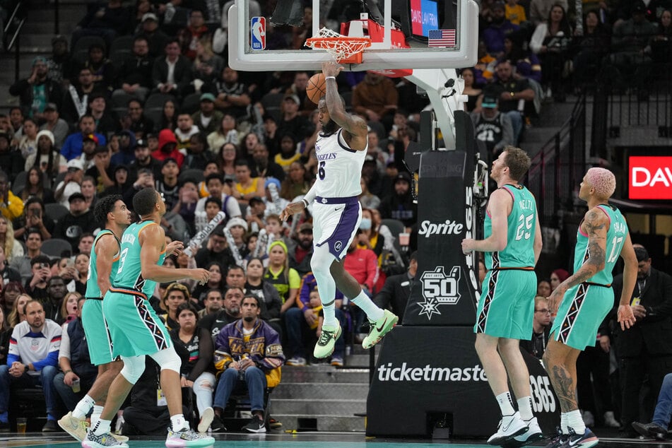 Los Angeles Lakers forward LeBron James dunks in the second half against the San Antonio Spurs at the AT&T Center.