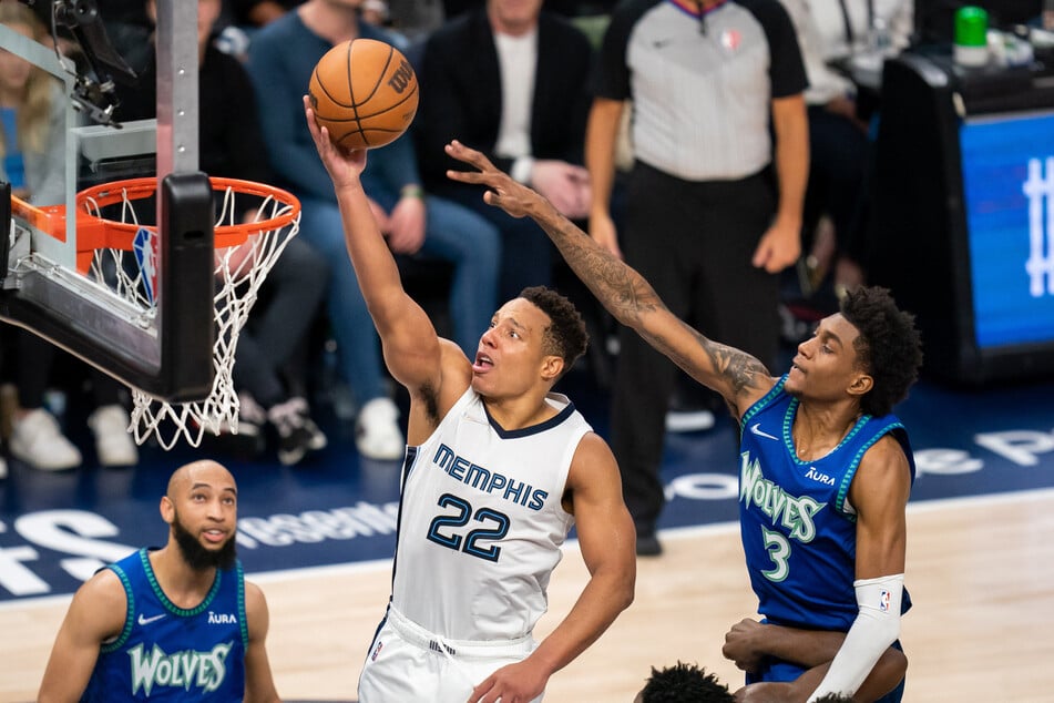 Desmond Bane (c.) top-scored in the game and throughout the series as the Grizzlies knocked out the Wolves.
