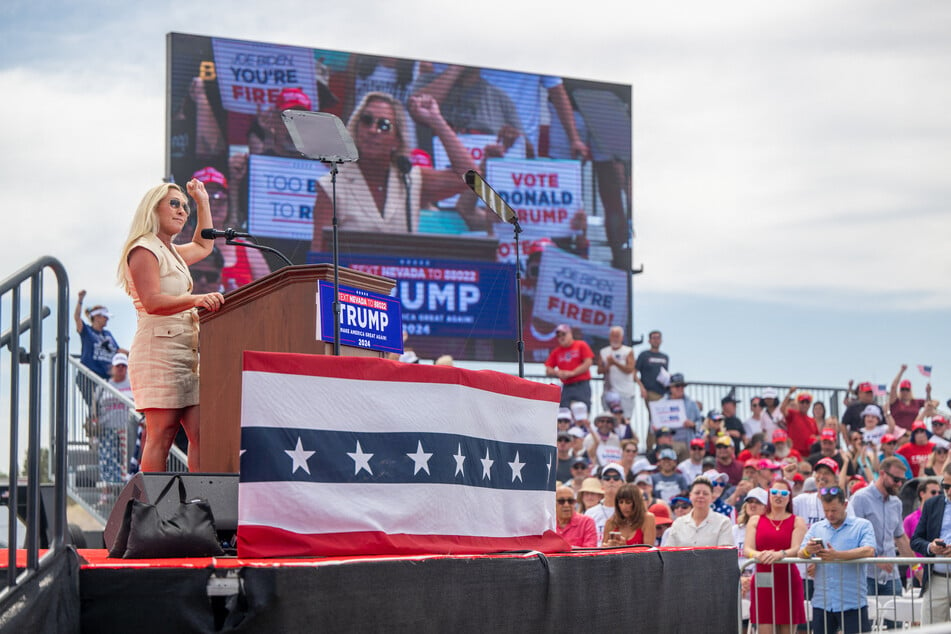 Georgia Congresswoman Marjorie Taylor Greene (l.) speaking to a large crowd at a rally for presidential candidate Donald Trump in Las Vegas, Nevada on June 9, 2024.