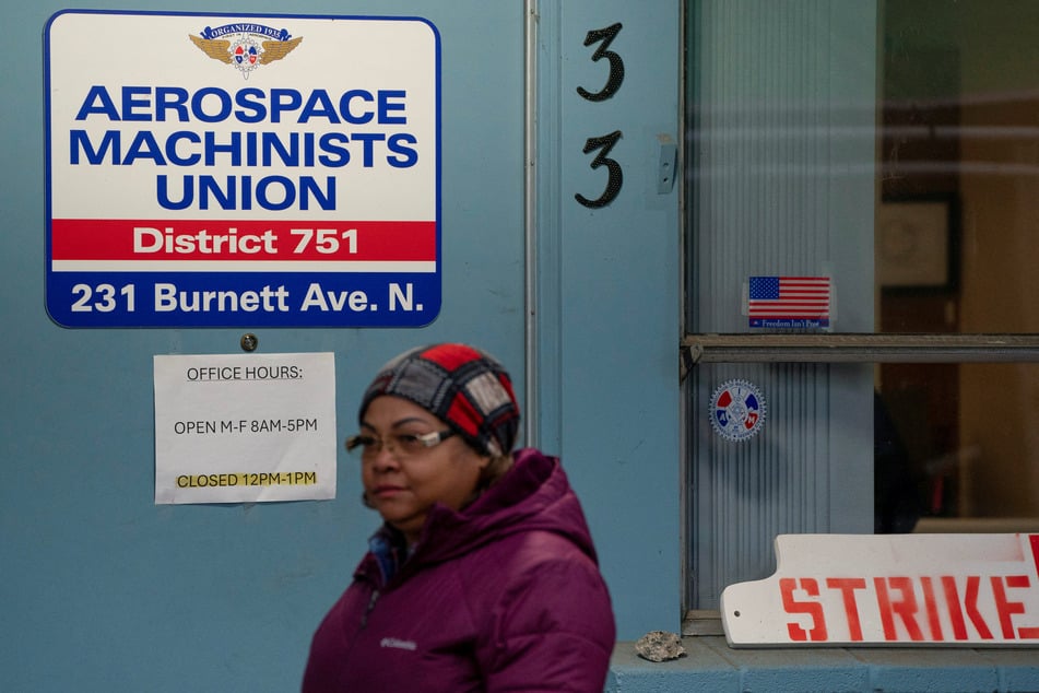 A Boeing worker from the International Association of Machinists and Aerospace Workers District 751 arrives to vote on a new contract proposal at a union hall in Renton, Washington.