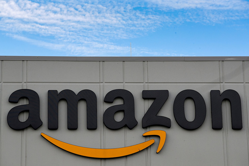 The Amazon logo is seen outside the JFK8 distribution center in Staten Island – the company's first facility in the US to unionize.