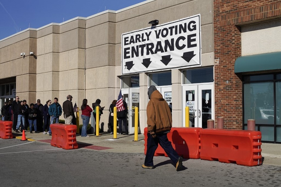 Residents line up to cast their ballots during early voting on November 3, 2023, in Columbus, Ohio.