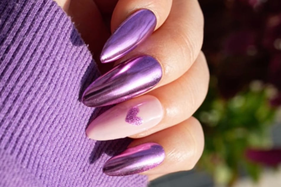 TikToker @SailorNailsArt's Purple Chrome Nails are heartbreaking but perfect for the non-traditional V-Day lovers.