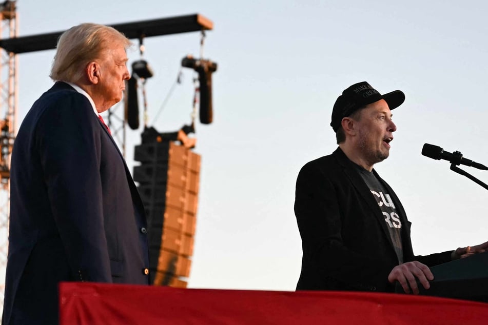 Elon Musk (r.) joined Republican presidential candidate Donald Trump during a campaign rally in Butler, Pennsylvania on October 5.