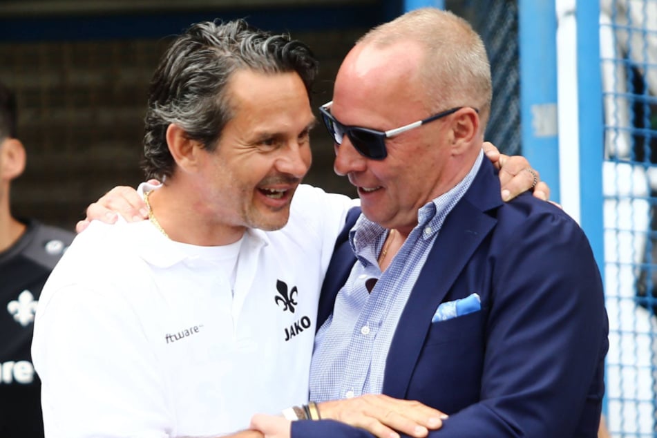 Da hatten sie sich noch lieb: Dirk Schuster (53), im Mai 2018 Darmstadt-Coach, und Aue-Boss Helge Leonhardt (62). Mittlerweile haben sich die Wege wieder getrennt.