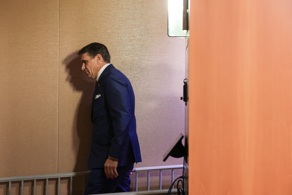Acting Attorney General Todd Blanche departs after speaking at a news conference about the DOJ's investigation of the Tren De Aragua gang.