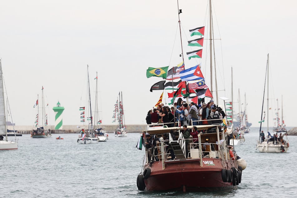 Boats of a new humanitarian flotilla bound for the Gaza Strip make a symbolic leave from Barcelona's Port Vell on April 12, 2026.