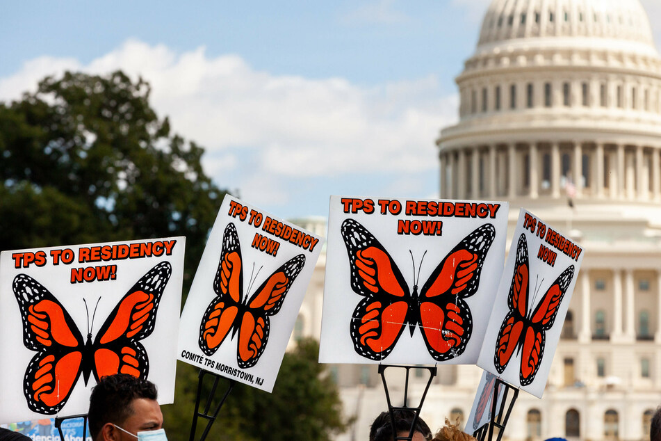 Protesters held signs with monarch butterflies – a frequent symbol of US immigrants – during a march for permanent residency for immigrants with temporary protected status in the US last week.