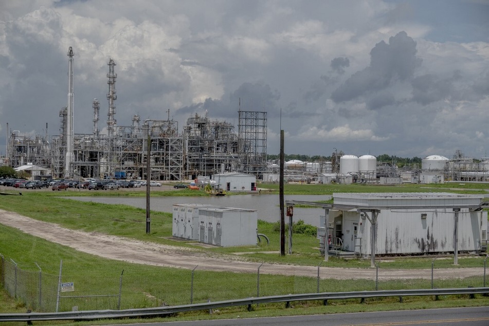 Silos, smokestacks, and brown pools of water line the banks of the Mississippi River in Louisiana, where scores of refineries and petrochemical plants have metastasized in over the last decades.