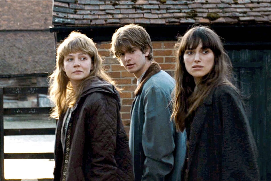 Never Let Me Go was adapted into a 2010 film starring, from left to right, Carey Mulligan as Kathy, Andrew Garfield as Tommy, and Keira Knightley as Ruth (archive image).