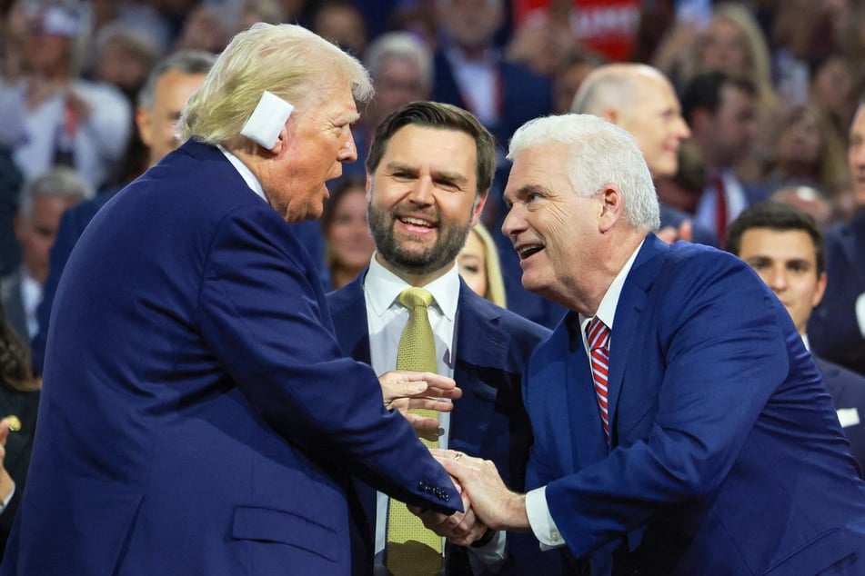 Donald Trump (l.) and JD Vance greeting Congressman Tom Emmer (r.) during the second day of the Republican National Convention in Milwaukee, Wisconsin on July 16, 2024.