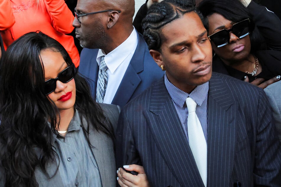 A$AP Rocky exits the court next to Rihanna after the verdict was given in his felony assault trial in Los Angeles, California.