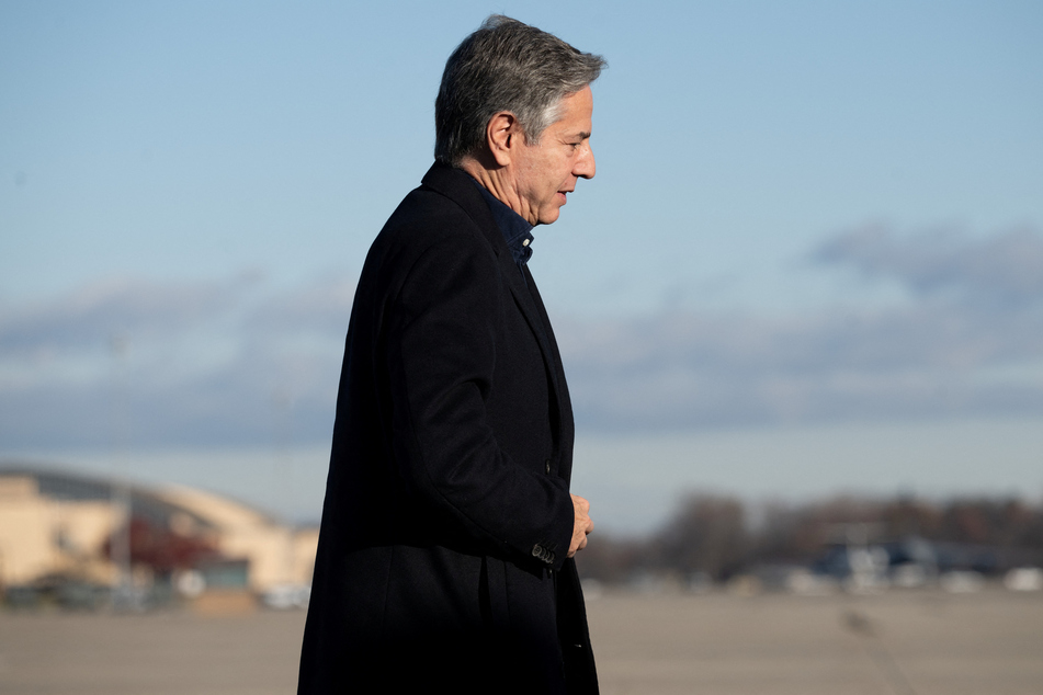 US Secretary of State Antony Blinken walks to board his aircraft prior to departure from Joint Base Andrews in Maryland on November 27, 2023.