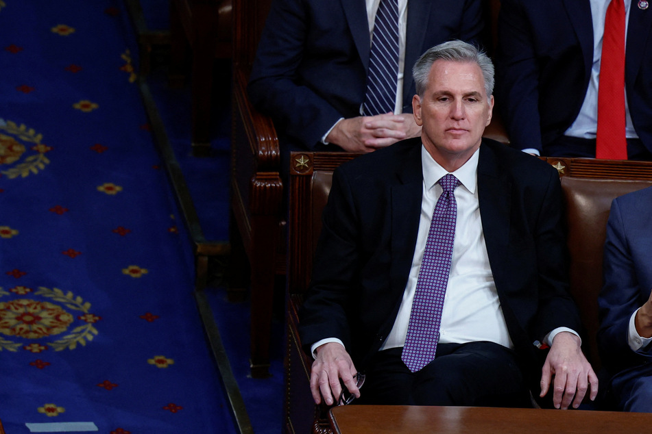 House Republican Leader Kevin McCarthy watches and listens as a fourth round of voting for a new Speaker of the House fails to elect him Speaker on the second day of the 118th Congress at the US Capitol in Washington DC.
