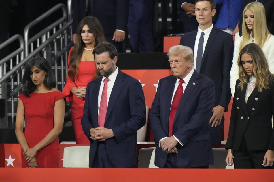 (From l. to r.) Usha and JD Vance standing in the family box with Donald Trump and his family during the Republican National Convention in Milwaukee, Wisconsin on July 18, 2024.