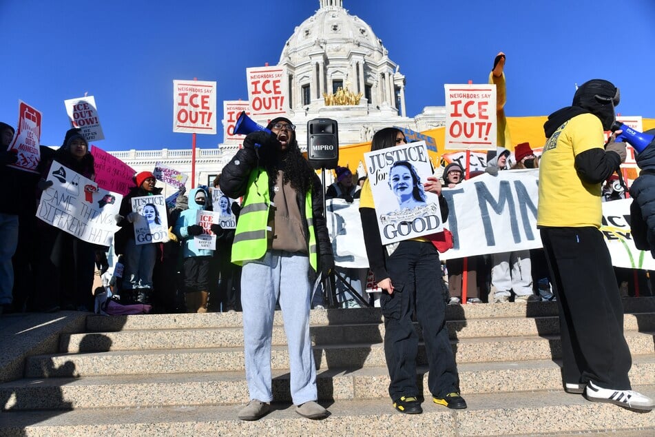 Anti-ICE activists protesting outside the State Capitol in St. Paul, Minnesota, to call for an end to federal immigration detentions and enforcement actions on January 14, 2026.
