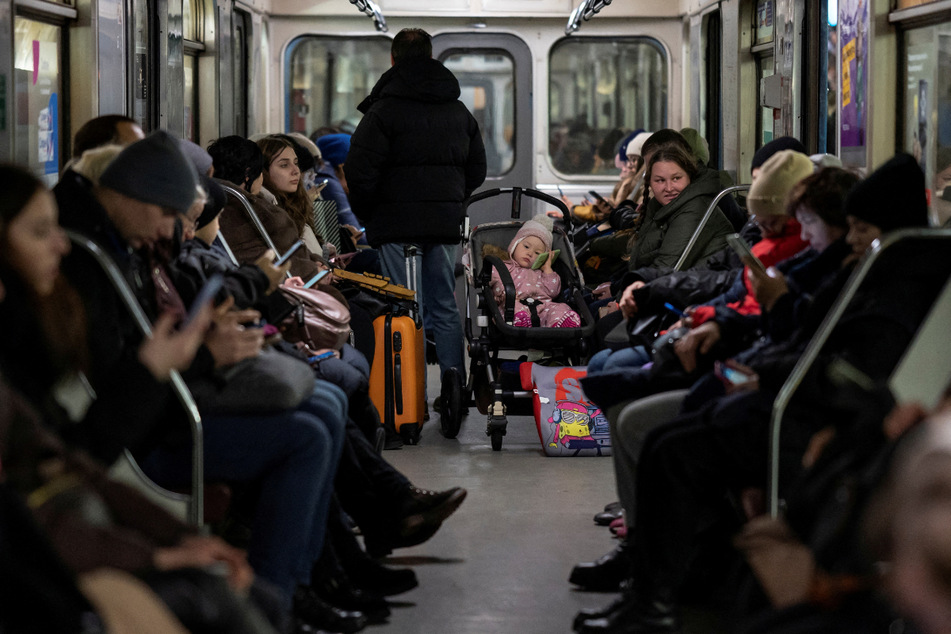 People sheltered inside a metro station during massive Russian missile attacks in Kyiv, Ukraine, on Friday.