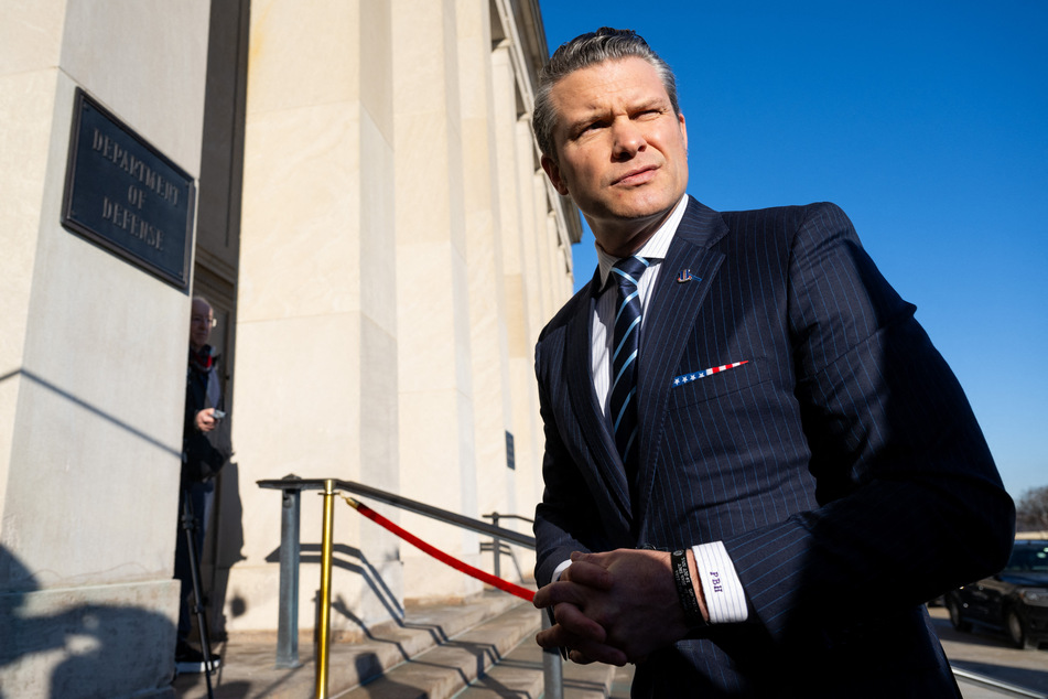 US Secretary of Defense Pete Hegseth speaks with the media during his first official arrival at the Pentagon as Secretary in Washington, DC, Monday.