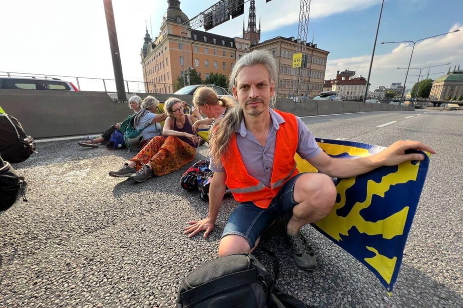 Christian Bläul während der Protest-Aktion am 17. August in Stockholm. Danach wurde der Dresdner festgenommen und kam für 16 Tage in Einzelhaft.