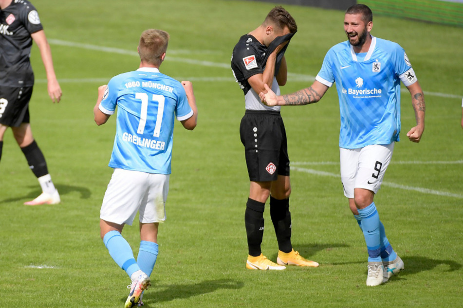 Fabian Greilinger jubelt mit Sascha Mölders über seinen späten Ausgleichstreffer.
