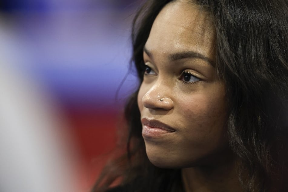 Shilese Jones has withdrawn from the US Olympic gymnastics trials after injuring her knee on a warm-up vault.