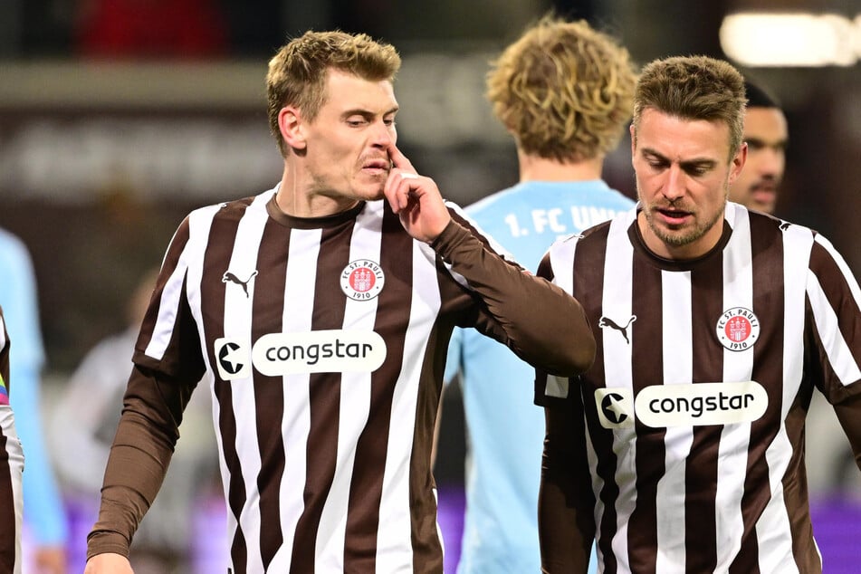 Der FC St. Pauli muss voraussichtlich gegen den VfB Stuttgart auf Hauke Wahl (31, r) und Eric Smith (29) verzichten.