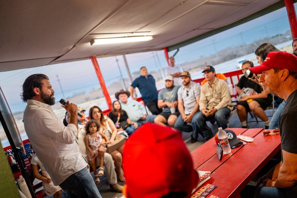 congressional candidate Brandon Herrera speaks during a campaign rally at the Constantino S Pizza restaurant on February 26, 2026 in Somerset, Texas.