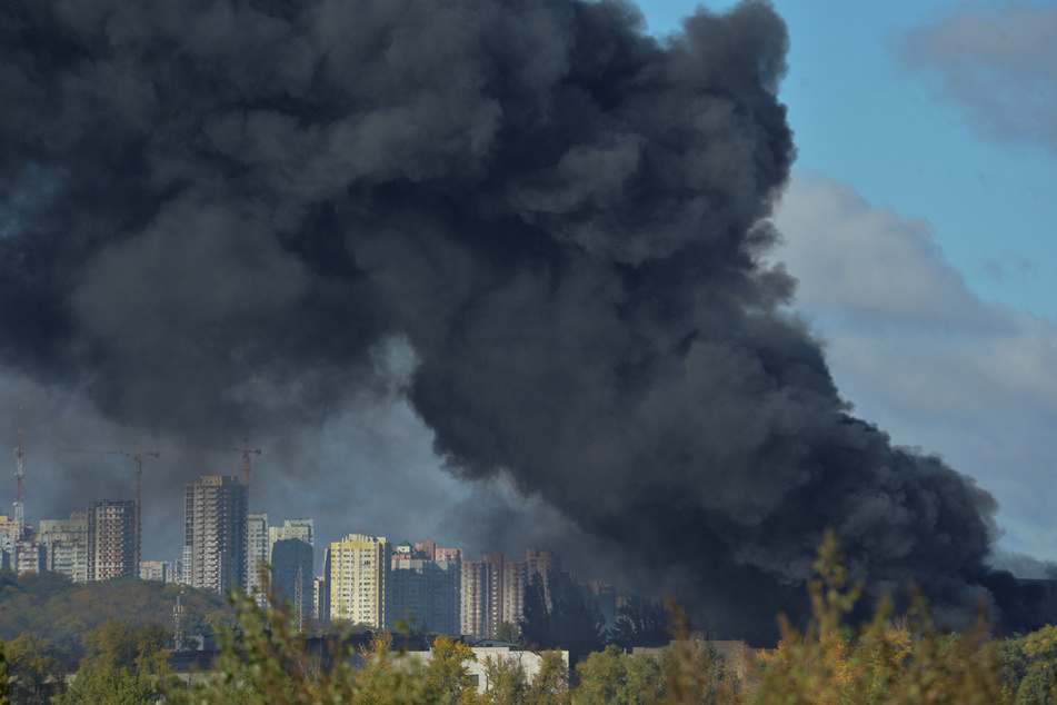 Smoke billows over Kyiv after a Russian missile strike on Ukraine's capital.
