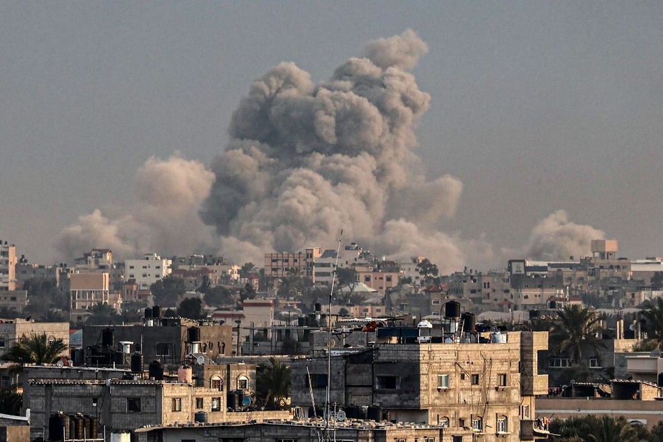 Smoke billowing over Khan Younis in the southern Gaza Strip during Israeli bombardment on January 15, 2024.
