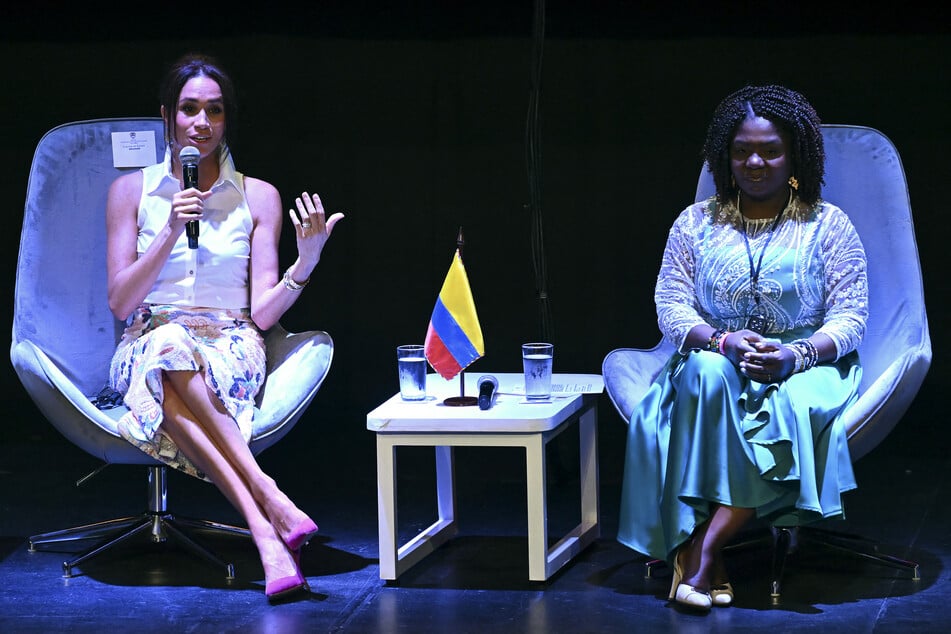 Meghan Markle (l.) addresses the audience next to Colombia's Vice-President Francia Marquez (r.) during the "Afro women and power" forum, at the Municipal Theatre in Cali, Colombia, on August 18, 2024.