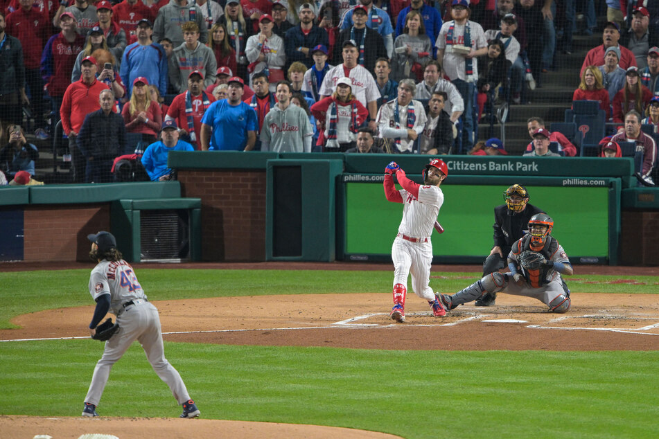 Philadelphia Phillies designated hitter Bryce Harper hits a two-run home run off of Houston Astros starting pitcher Lance McCullers Jr. during the first inning in Game 3 of the 2022 World Series at Citizens Bank Park.