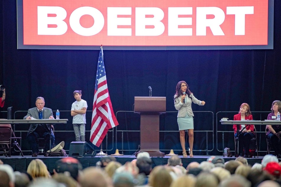On Friday, Colorado Congresswoman Lauren Boebert (center r.) won enough GOP delegate votes to secure her name on ballots for the upcoming primary election.