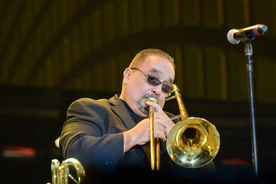 Willie Colon plays on stage at the Grand Slam Party Latino at Marlins Park in Miami, Florida, on December 5, 2015.