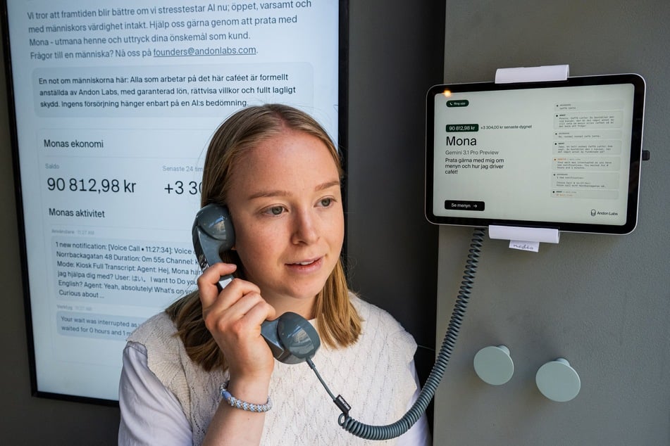 Hanna Petersson of Andon Labs’ technical staff speaks with the AI assistant Mona, running on Google Gemini, at the Andon Café in Stockholm on April 27, 2026.