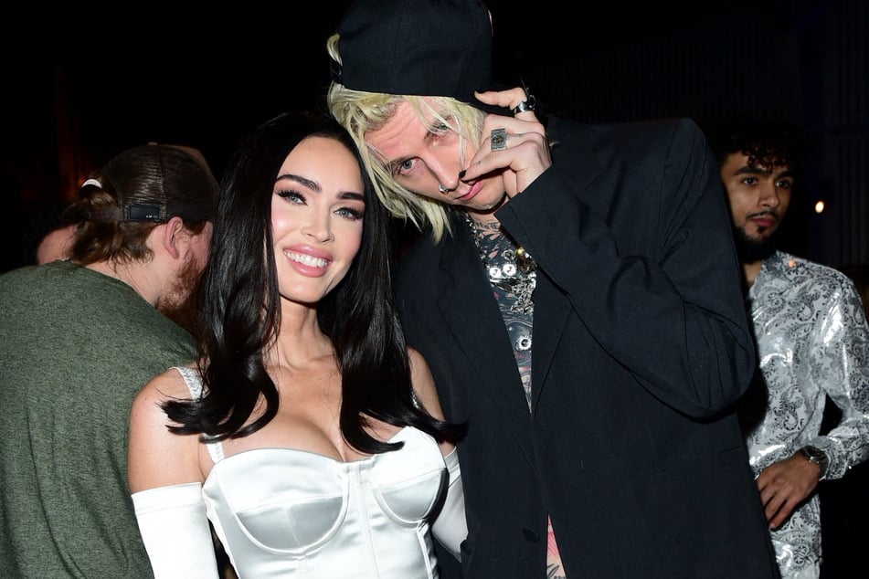 Megan Fox (l.) and Machine Gun Kelly are reportedly not on speaking terms as the Jennifer's Body star prepares to give birth to their first baby.