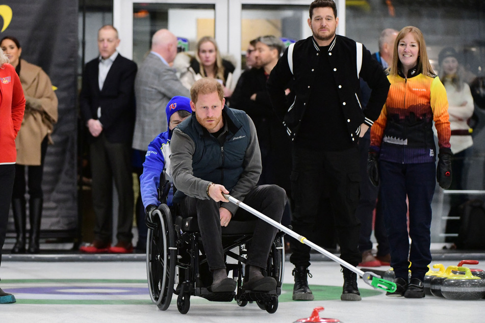 Prince Harry (c.) launched the Invictus Games in 2014.