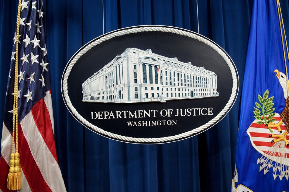 The Justice Department has ended its prosecution of two former co-defendants of President Trump who were accused of mishandling classified documents.