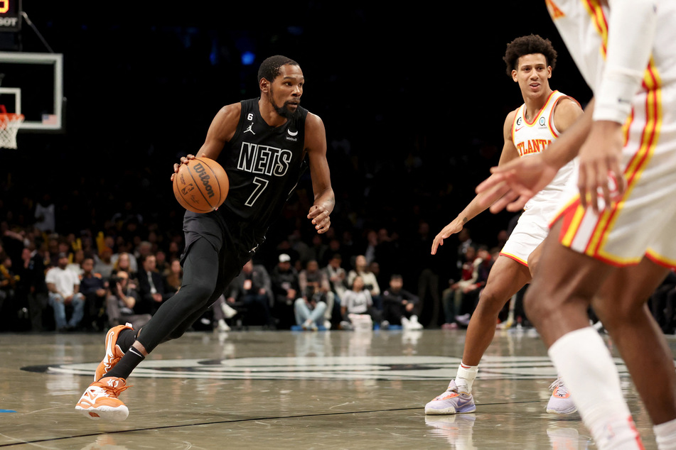 Brooklyn Nets forward Kevin Durant drives to the basket against Atlanta Hawks forward Jalen Johnson during the fourth quarter at Barclays Center.