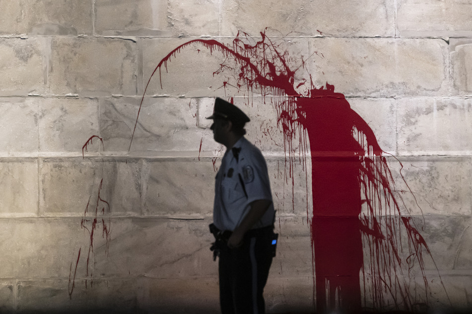 Red paint splashed on the Washington Monument in Washington DC.