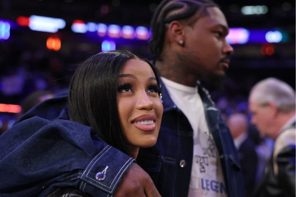 Cardi B (l.) and Stefon Diggs are expecting their first child together amid ongoing divorce drama with Offset.