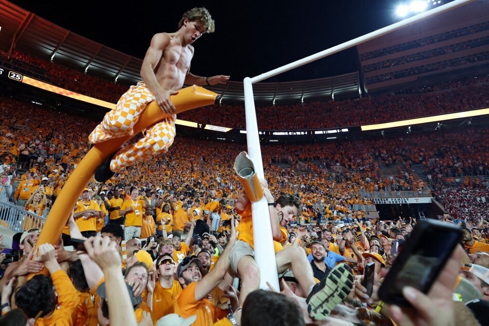 Following a huge upset over Alabama, Tennessee football fans stormed the field and caused major destruction to the stadium including tearing down the goalposts at Neyland Stadium.