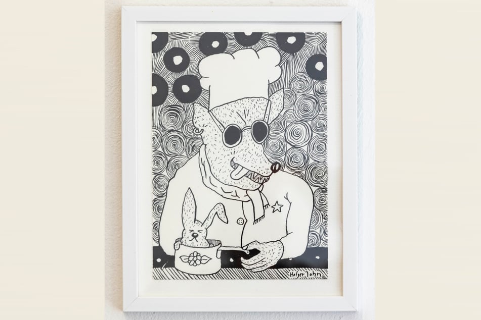 Der Wolf kocht sich einen Hasen – insgesamt 69 Wolfszeichnungen hängen nebeneinander.