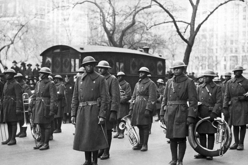 February 17, 1919: Lt. James Reese Europe and members of his 369th Infantry Regiment jazz band upon their return to the United States from Europe (archive image).