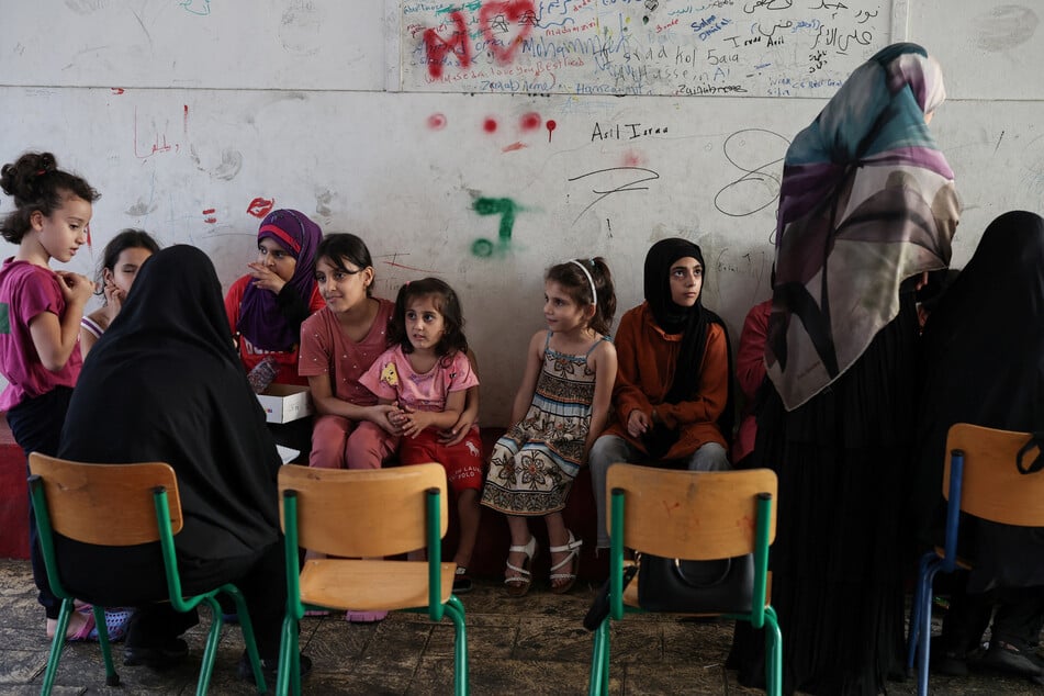 Displaced people, including children, shelter at a school in Beirut as Israel ramps up its attacks on Lebanon.