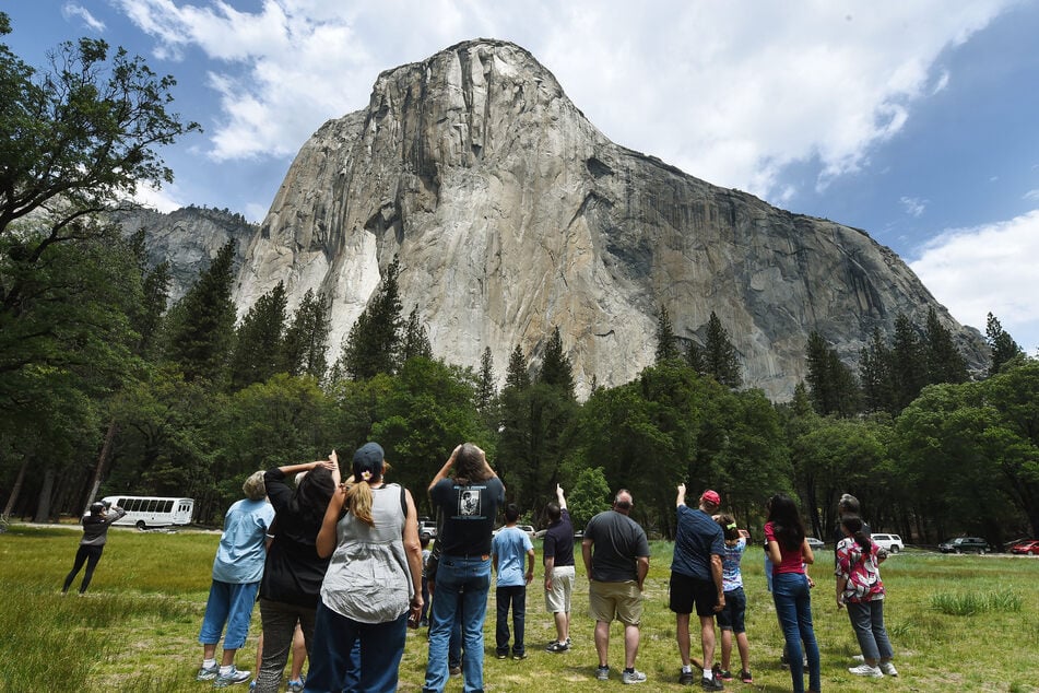 Visitors look up at the El Capitan monolith in the Yosemite National Park in California on June 4, 2015. A noted climber Balin Miller fell to his death off El Capitan during an ascent that was reportedly being livestreamed on social media.