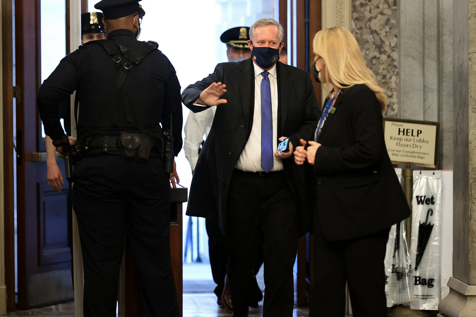Mark Meadows (c.) arriving at the Capitol for the first day of former President Donald Trump's second impeachment trial in February.