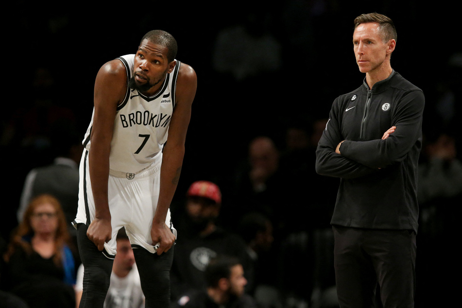 Brooklyn Nets forward Kevin Durant (l.) and head coach Steve Nash react during the game against the Miami Heat at Barclays Center.