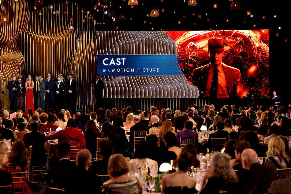 Oppenheimer actors accept the award for Best Outstanding Performance by a Cast in a Motion Picture during the 30th Screen Actors Guild Awards in Los Angeles, California.