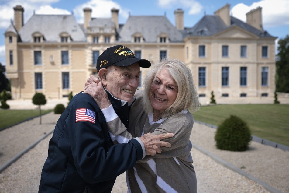 American World War II veteran Harold Terens and his fiancée Jeanne Swerlin embrace outside the Chateau de Villers-Bocage, ahead of their wedding.